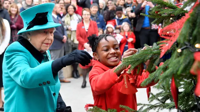 The Queen decorates the tree at Coram's Queen Elizabeth II Centre last year