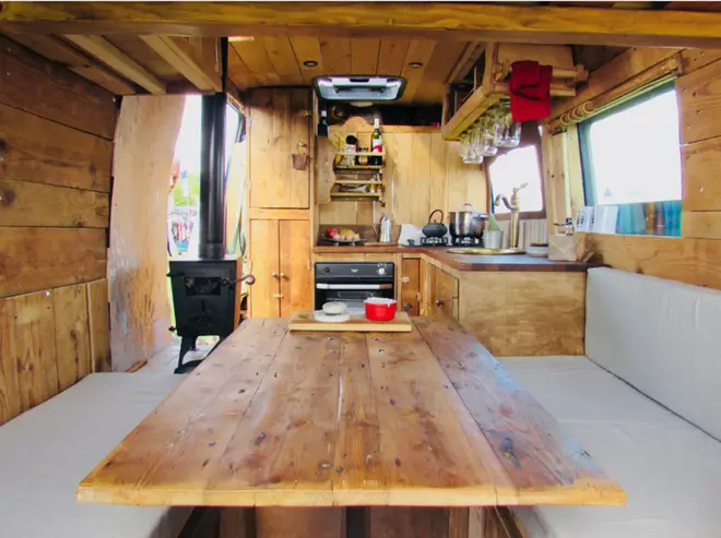 Buttercup is a warm and inviting campervan whose wooden interior is gloriously rustic.