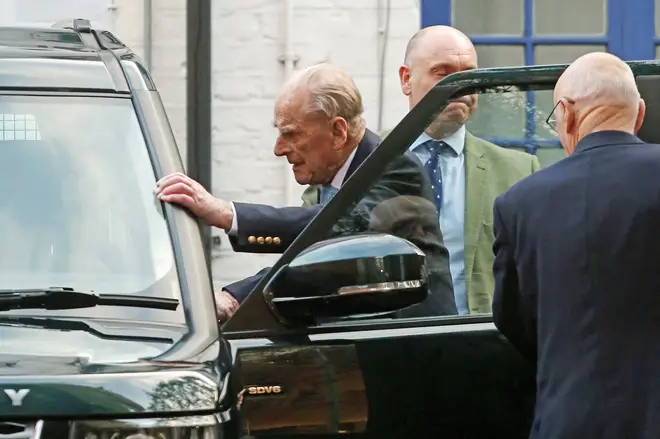 The Duke reportedly looked tired and frail as he left the hospital this morning, but walked to his car in a smart shirt and suit
