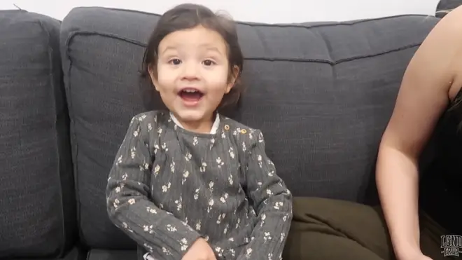 The little girl was grateful for the banana and asked her mum to open it immediately