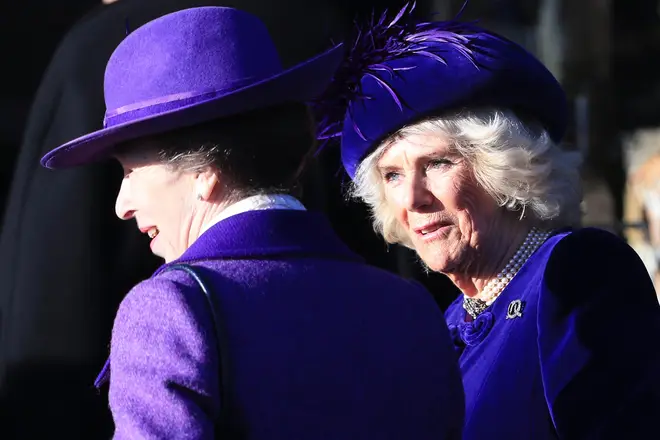 Princess Anne and Camilla, the Duchess of Cornwall, both dressed in purple ensembles
