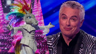 John seemed to reveal he was the unicorn on The Masked Singer