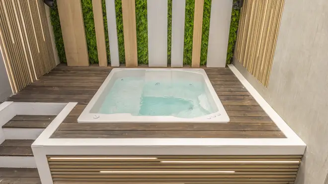The villa features a brand-new hot tub