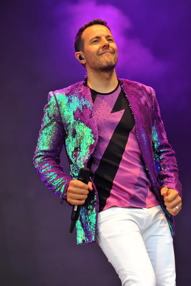Lee on stage with Steps at Kew The Music in 2018