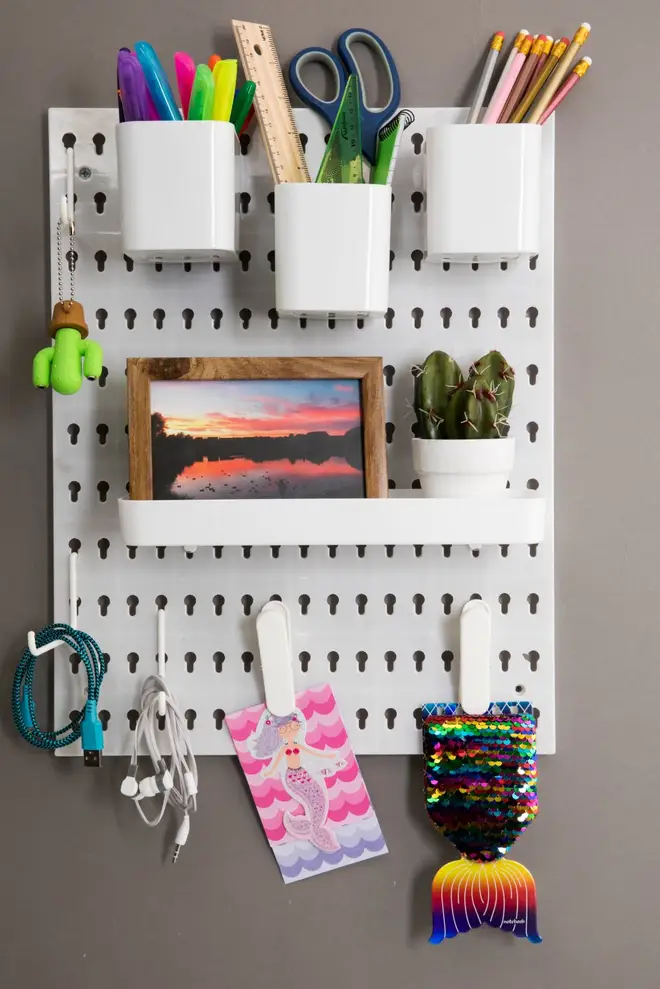 This white peg board is perfect for storing stationery – and is just £2.
