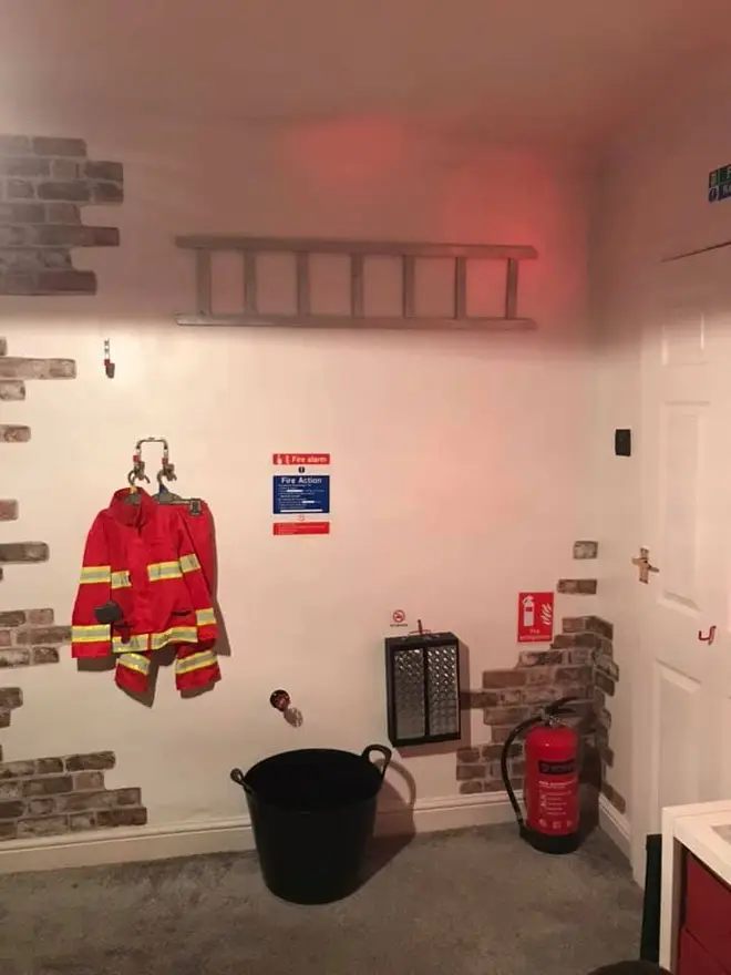 The room is complete with a ladder and fire extinguisher too