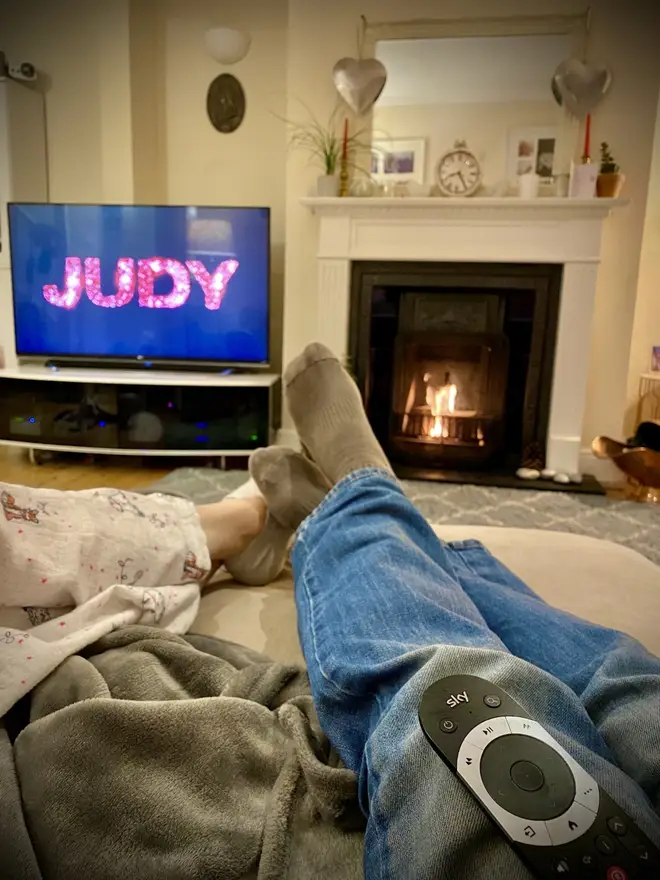JK and wife Charlie settle down to watch Judy in Sky Store