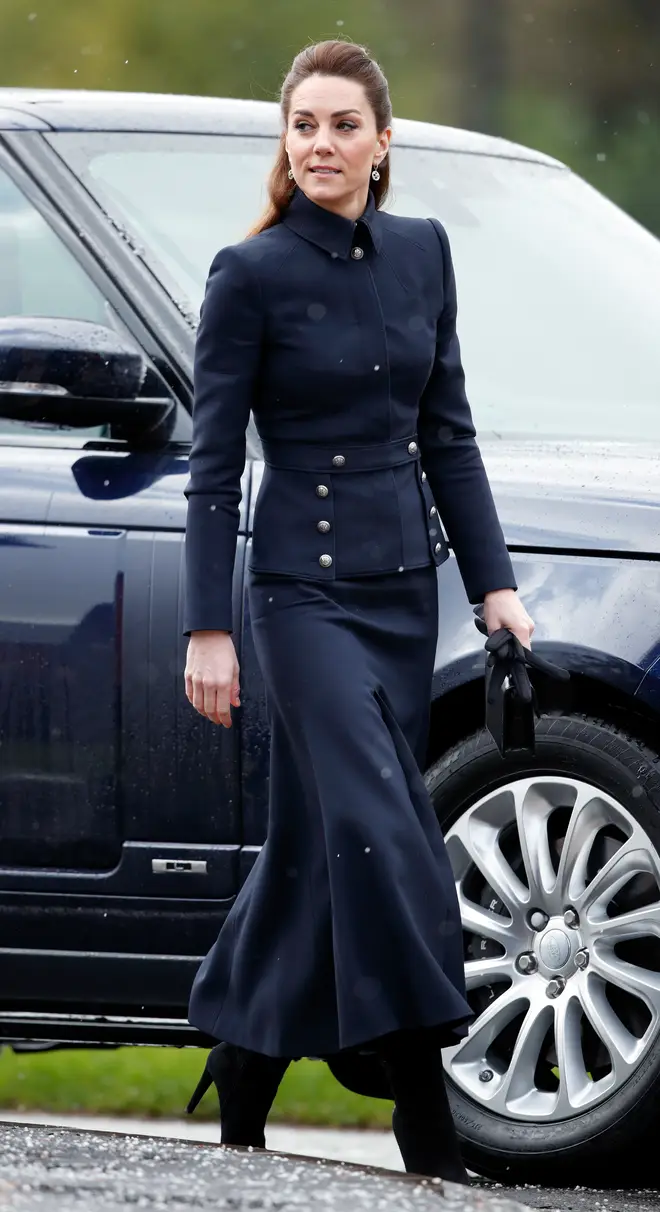 Kate Middleton often holds bags in her left hand