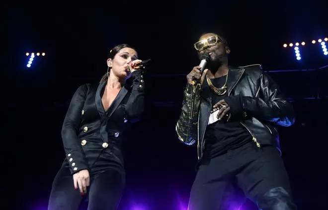 Cheryl and Will.i.am performing