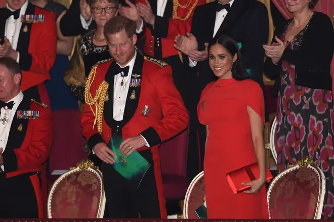 Harry and Meghan were in good spirits as they beamed at cheering crowds.