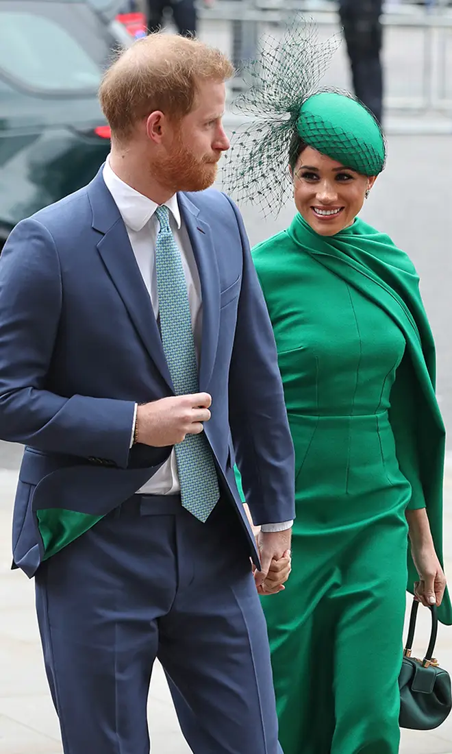 Prince Harry matched wife Meghan Markle with emerald green lining in his suit