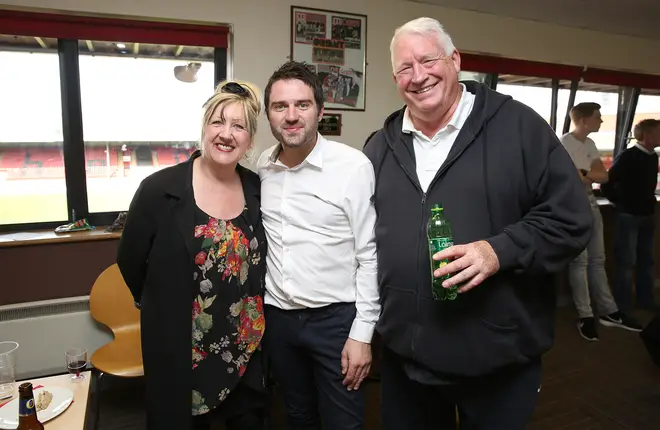 Linda, George and Pete pictured at a charity football match in 2015