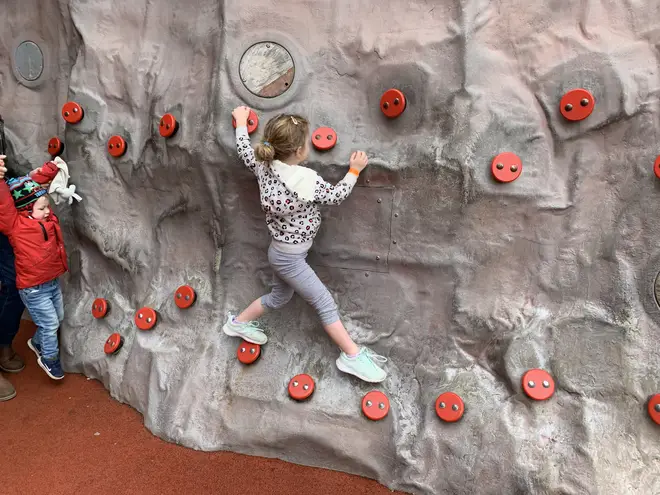 Ruby enjoyed the climbing wall in the Lego Ninjago world