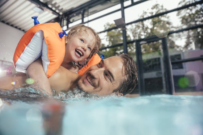 Swimming pools count as public spaces, which should generally be avoided at this time (stock image)