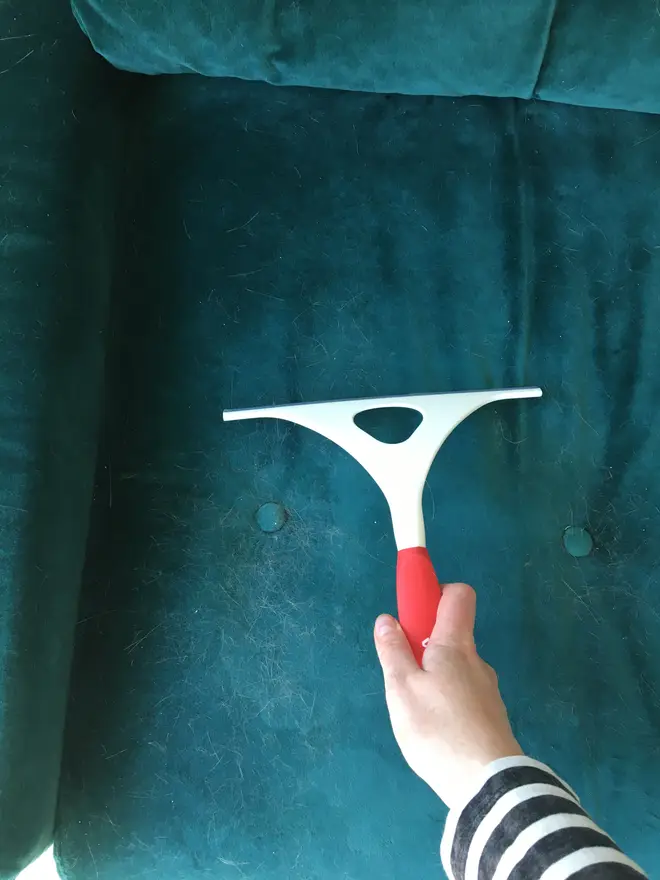 The rubber edge of the squeegee made getting the hairs off a quick (and satisfying) job