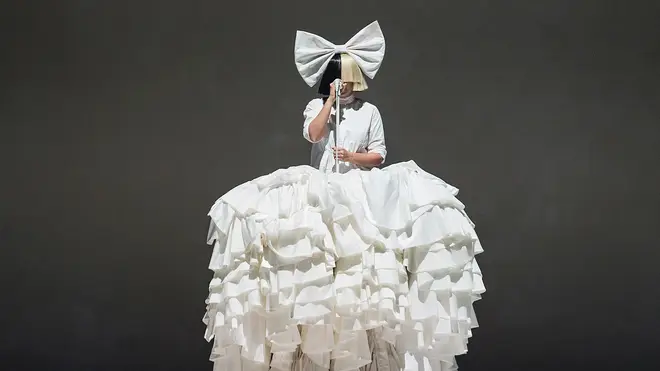 Sia is known for performing in a monochrome wig