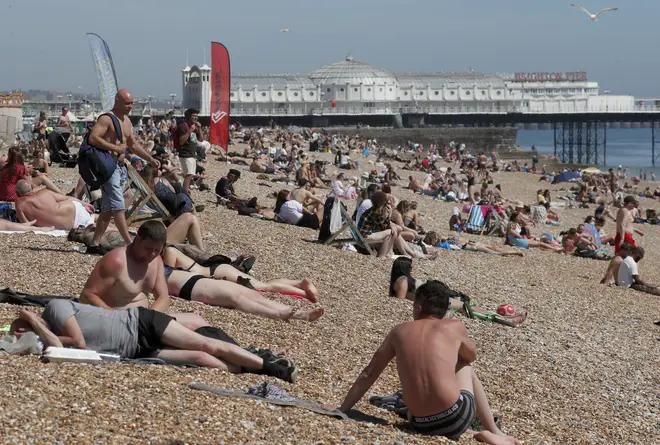 They were discussing pictures of packed beaches in England, such as this one of Brighton beach