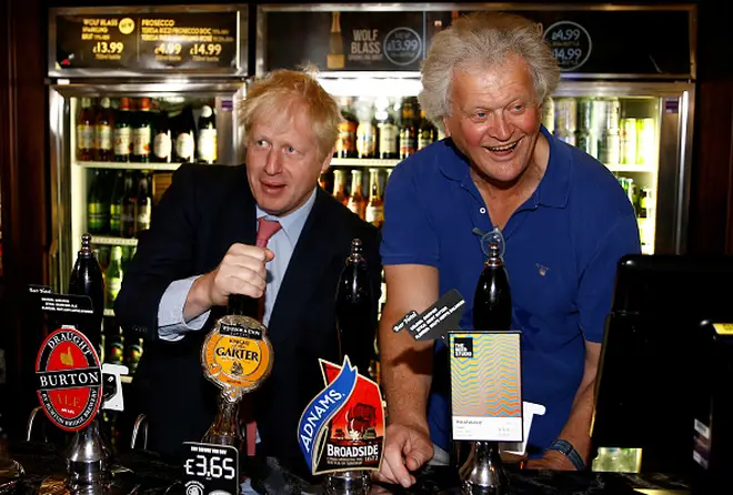 Boris Johnson with Tim Martin at Wetherspoons last July