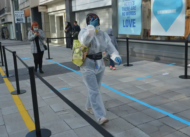 A woman in Birmingham is taking precautions in Primark