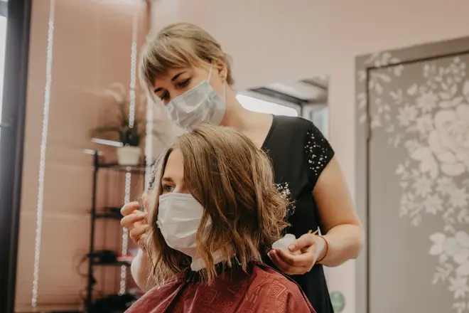 Hairdressers will be required to wear protective equipment when they start work again (stock image)