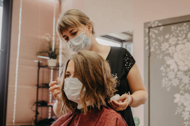 Hairdressers will be required to wear protective equipment when they start work again (stock image)