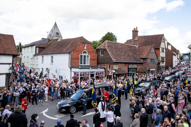 Hundreds of people paid their respects to Dame Vera as her coffin was carried through the village