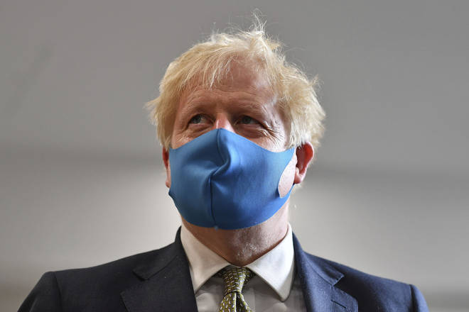 Boris Johnson said wearing face coverings in shops is "very important"