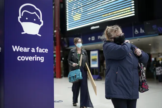 Face coverings are mandatory on public transport in England (stock image)
