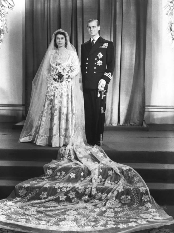 The Queen's dress was made from ivory silk and featured a show-stopping 13ft train