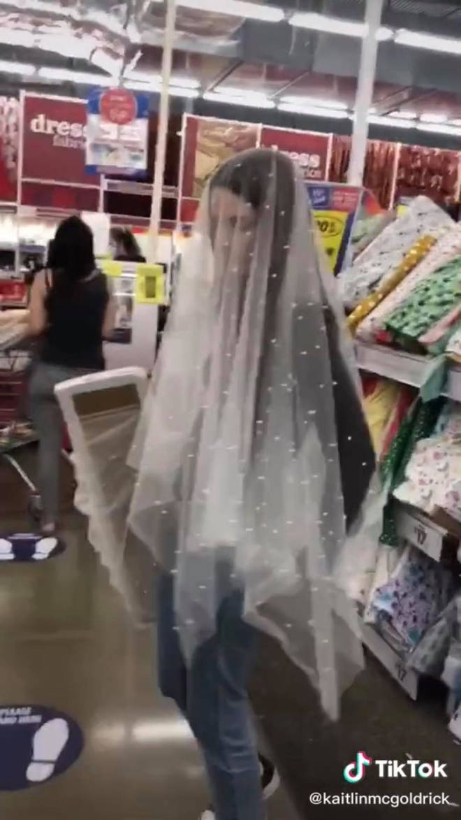 Kaitlyn found material which she made into a veil for her budget wedding
