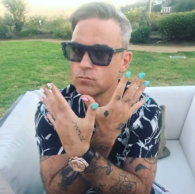 Robbie has 30 tattoos in total