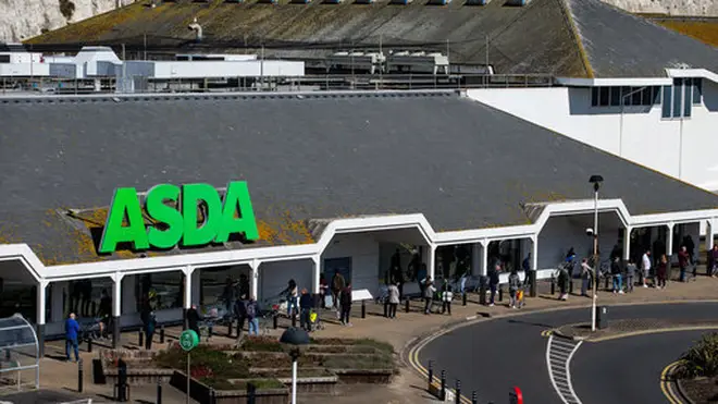 Asda shoppers queueing outside a store