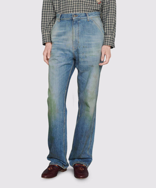 The jeans are made from 100 per cent organic cotton and feature a 'stained-like, distressed effect'