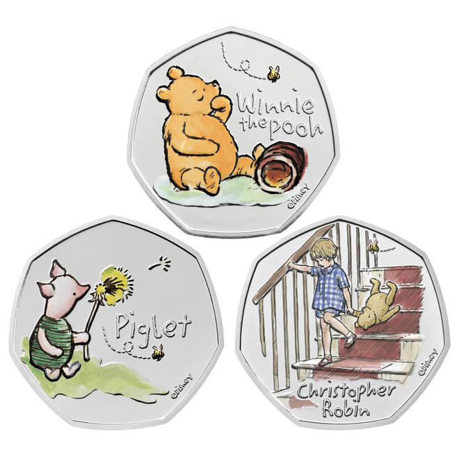 The coins feature illustrations from E. H. Shepard