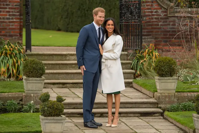 Meghan and Harry posted for engagement pictures in the Sunken Garden