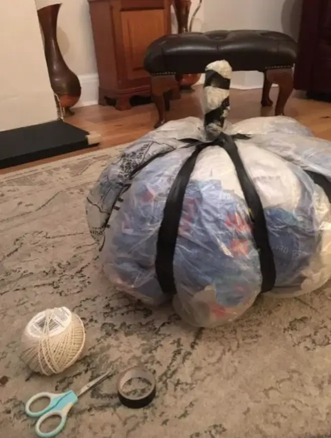 The pumpkin was made out of old bills and wrapping paper