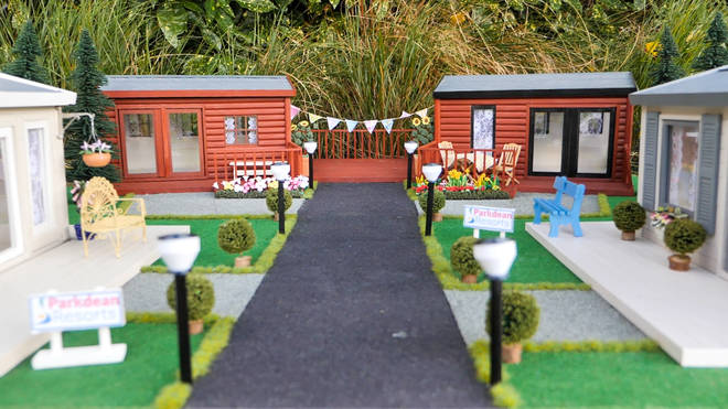 The hedgehog holiday park has bunting and mini street lamps