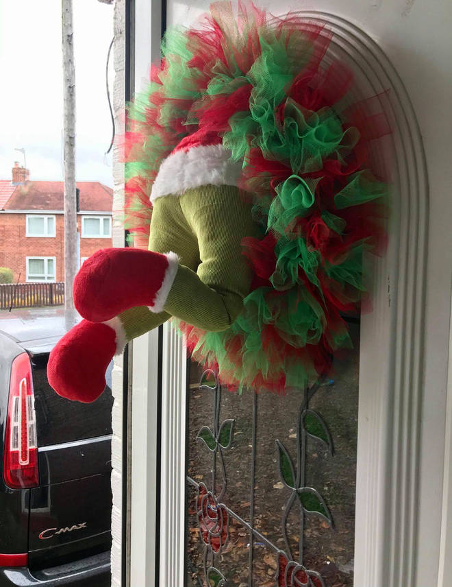 Laura created a Grinch wreath for her front door