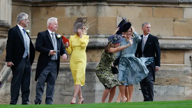 Guests arrive for Princess Eugenie's wedding - and struggle with their hats
