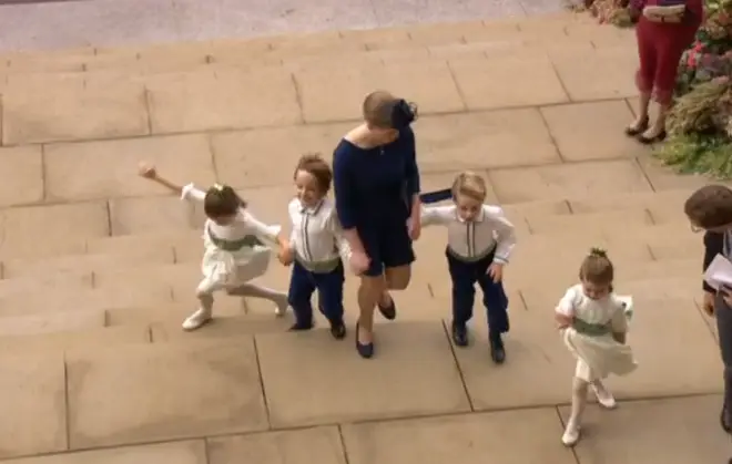 The bridesmaids and page boys were almost blown away on the steps