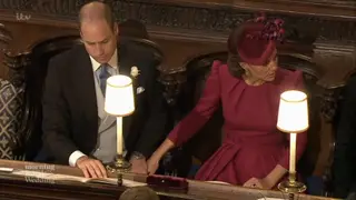 Prince William and Kate Middleton hold hands at the royal wedding