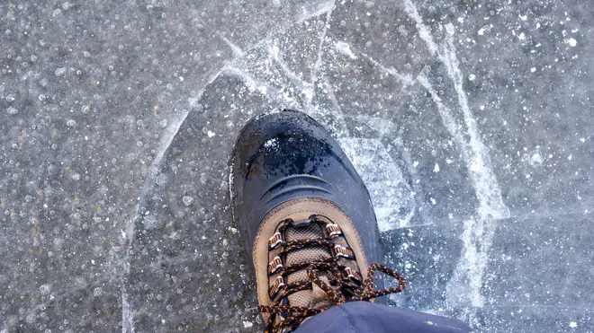The woman warned people you can easily slip on the ice caused by de-icing cars with water