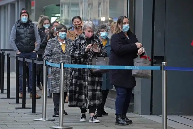 Shoppers queue outside Primark in Newcastle this morning