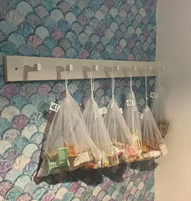 The mum used mesh bags from Aldi to hang the toys up