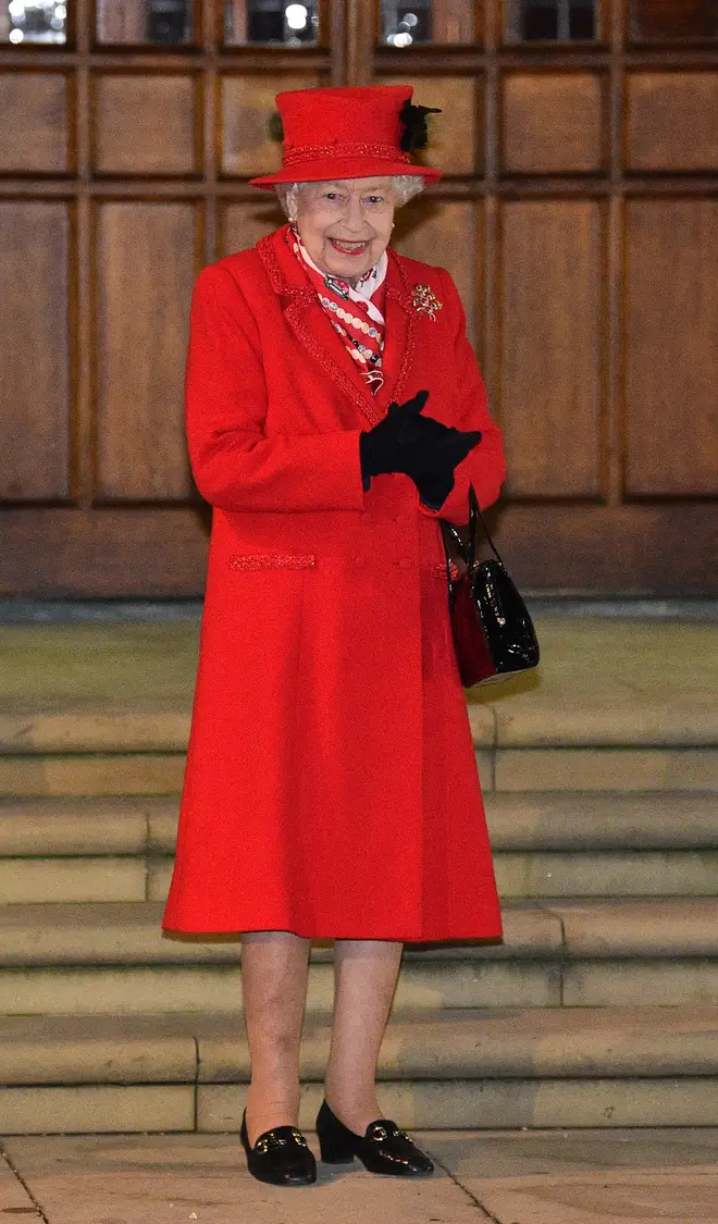 The Queen looked chipper in her 'Christmas Red' ensemble