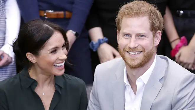 Meghan Markle smiles at Prince Harry during royal outing