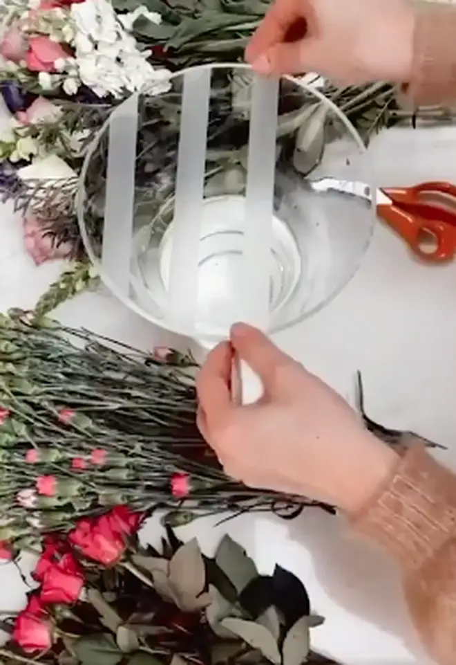 Creating the grid on the vase means the flowers will stay in place and will look fuller