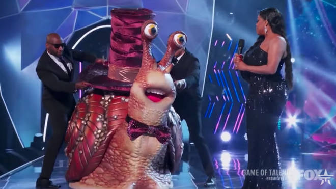 The judges were shocked to find Kermit the Frog was hidden behind the snail costume