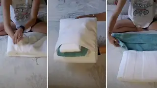 The woman unveils beautifully-folded towels