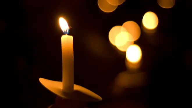 People are being encouraged to light candles for those who have died of Covid